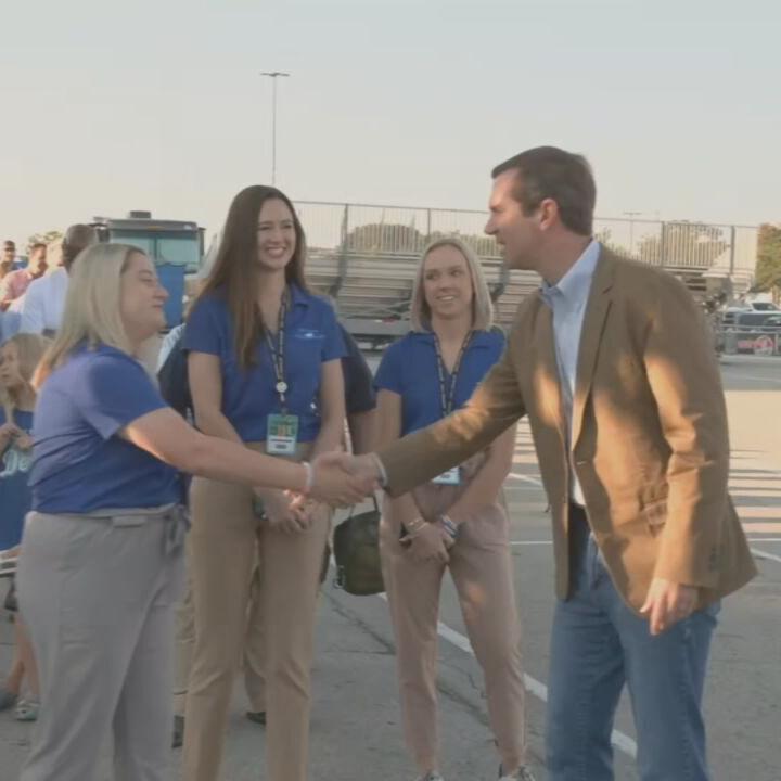 Gov. Beshear shakes hands with people at Kentucky State Fair